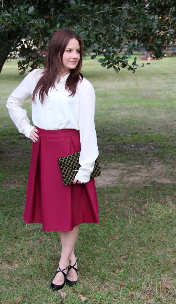 Cream Silk Blouse paired with a-line midi skirt