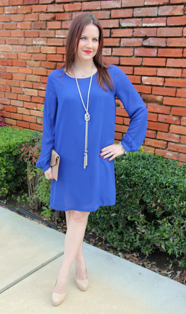 Perfect Shade of blue shift dress with long silver necklace and nude pumps, outfit idea