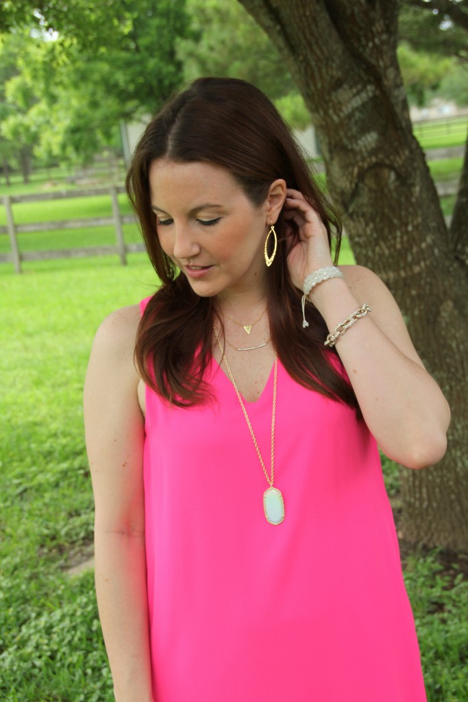 Bright Pink Dress accessorized with gold jewelry | Lady in Violet