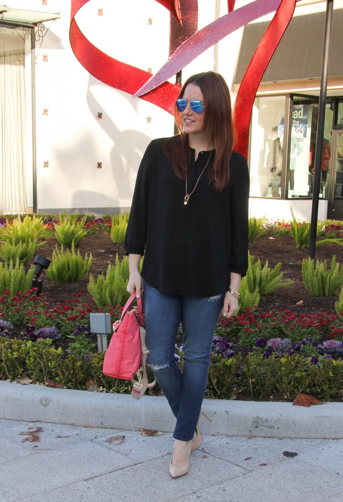 spring outfit idea - distressed denim, black blouse, and blush heels | Lady in Violet