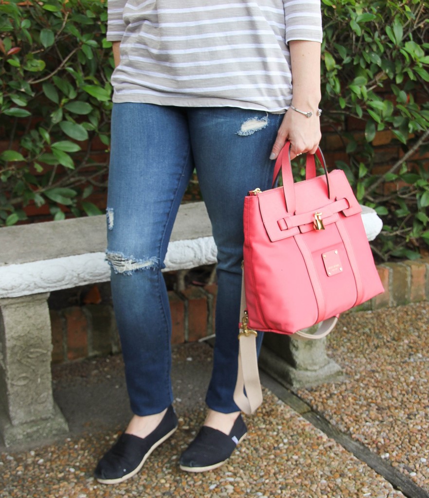 distressed denim and toms with henri bendel mini jetsetter