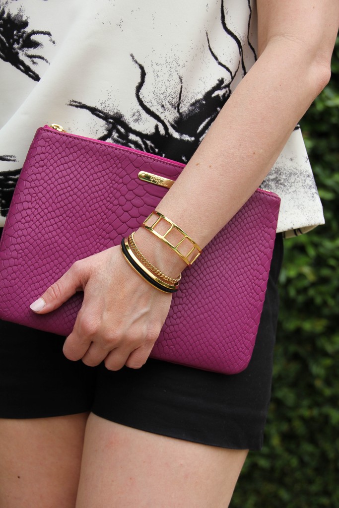 pink clutch and hair tie bracelet