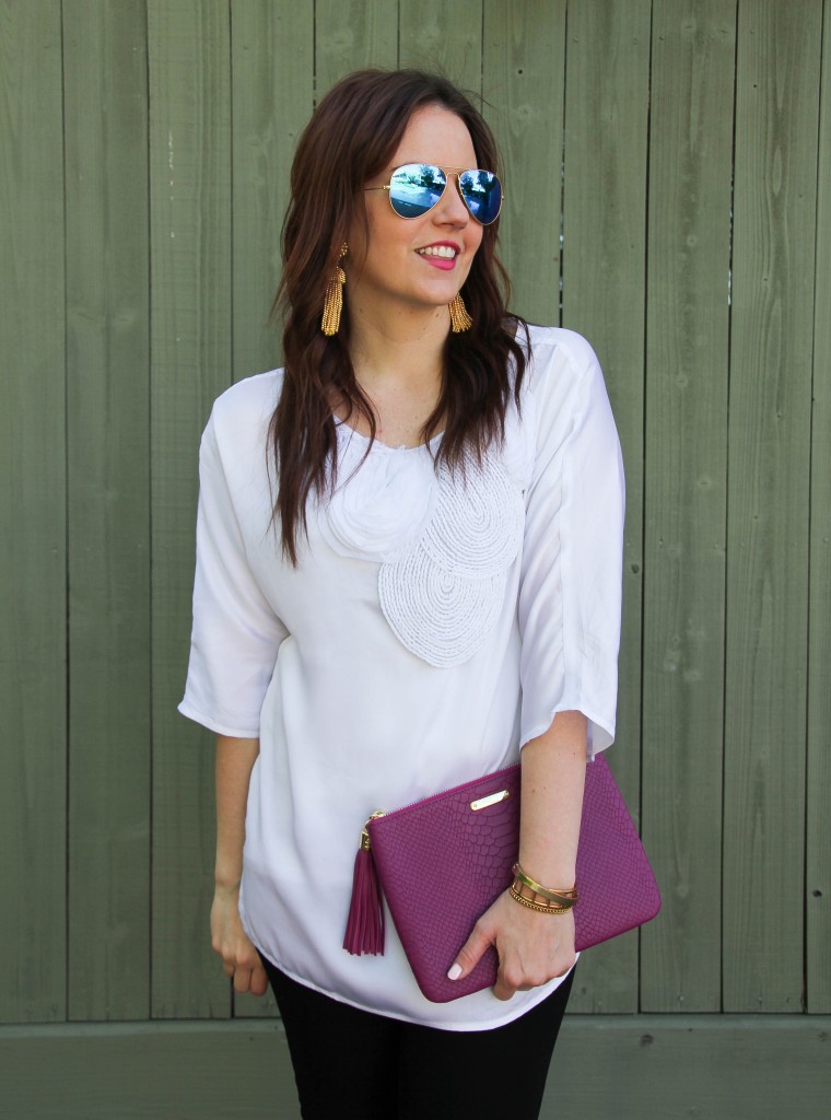 gold tassel earrings and blue mirrored aviators