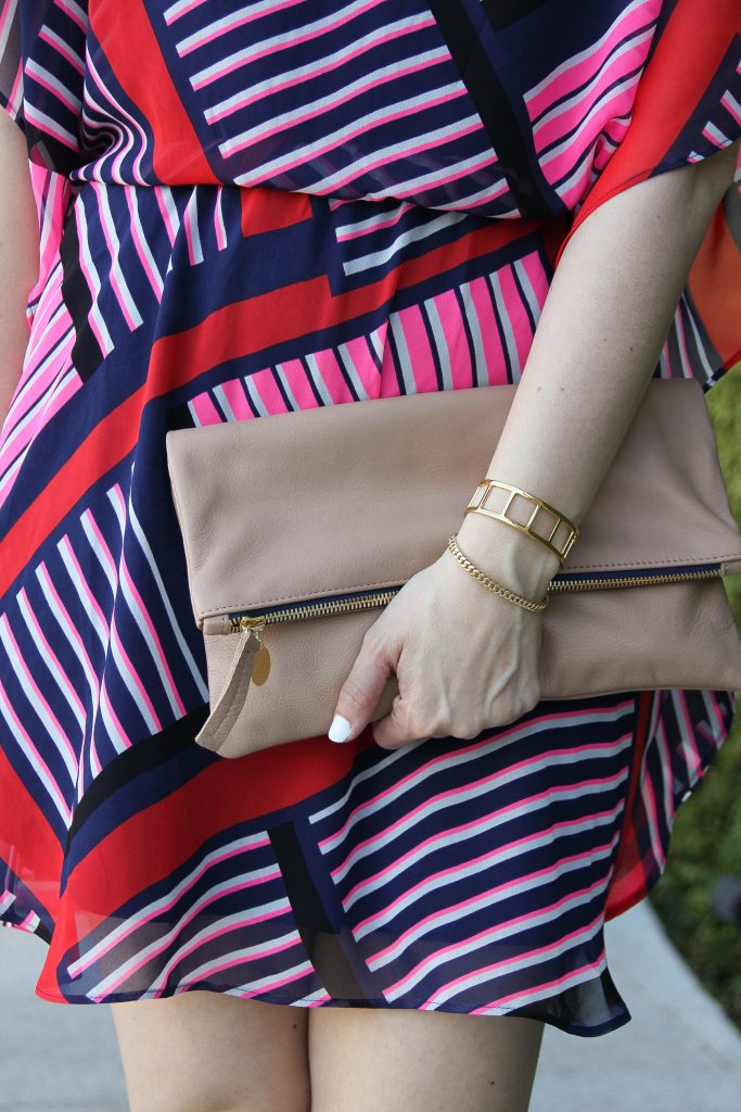 express dress with clare v clutch and baublebar gold bracelets