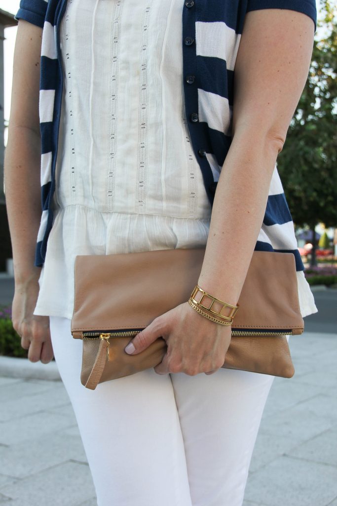 white ruffle blouse and perfect clutch for summer!