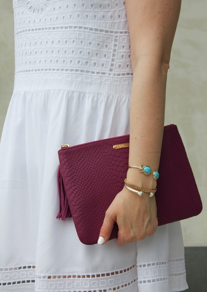 kendra scott andy bracelet in turquoise and pink clutch