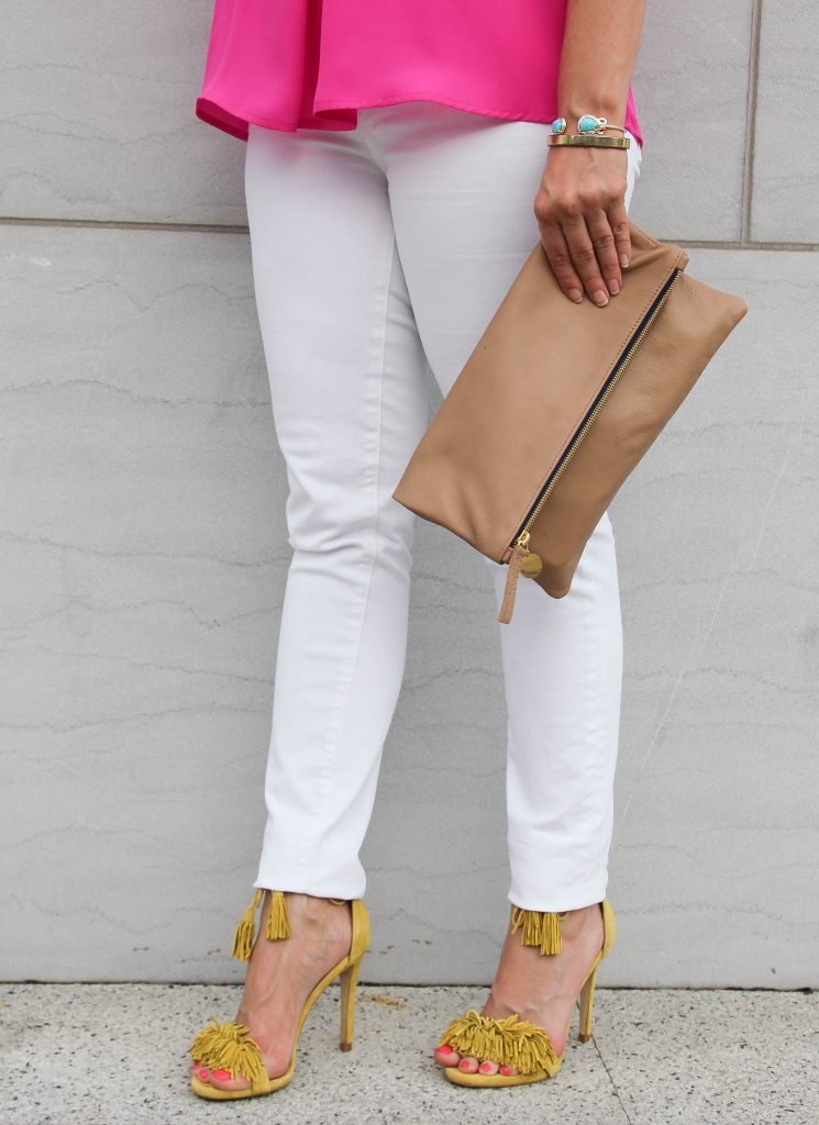 yellow fringe sandals and white skinny jeans