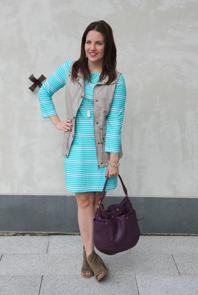 Fall outfit idea featuring a turquoise shift dress and khaki utility dress.