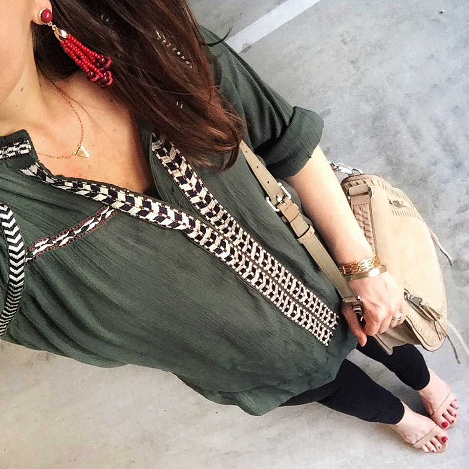 olive tunic with red tassel earrings
