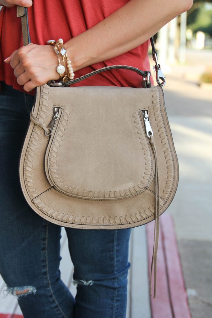 LadyinViolet wears the Rebecca Minkoff Vanity Saddle Bag.