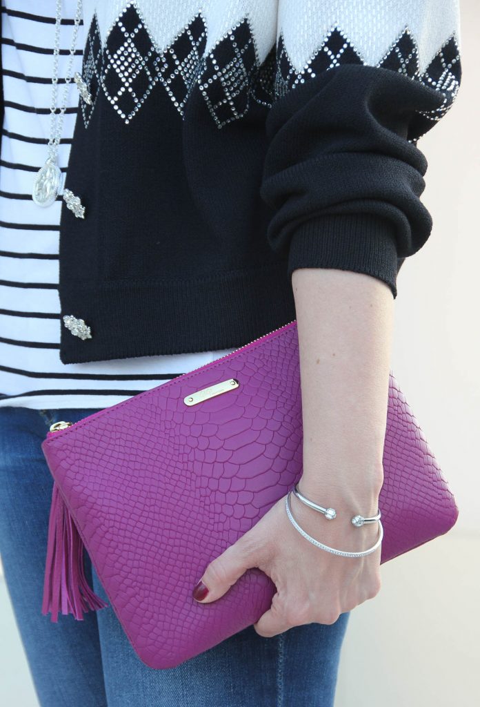 The best clutch for a party - the magenta all in one bag.