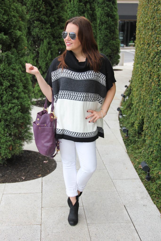 fall outfit idea with white jeans black ankle boots