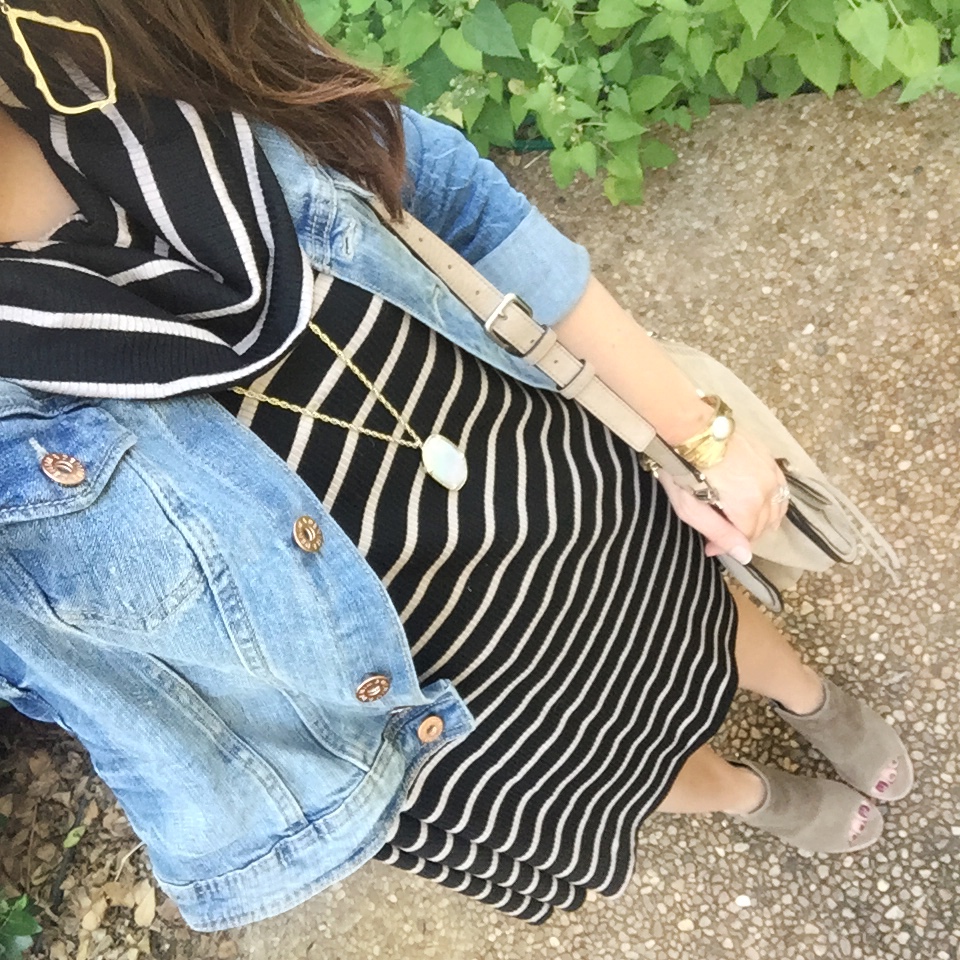 A casual fall outfit idea with a striped cowl neck dress and denim jacket.