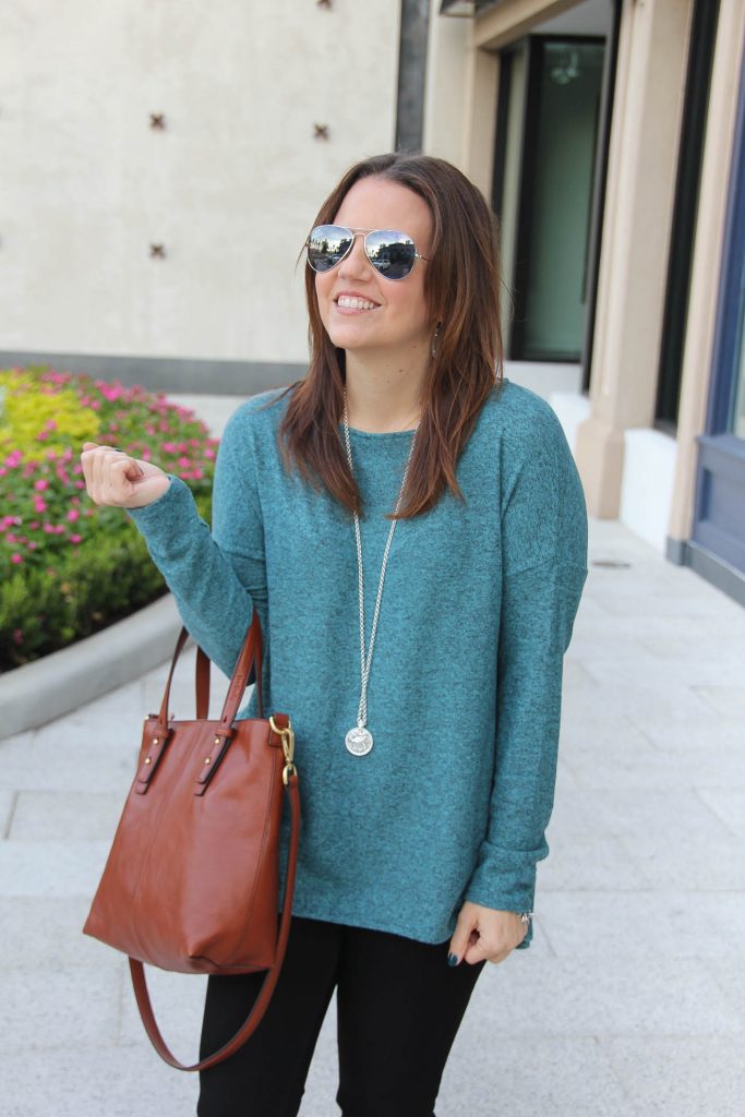 Texas Fashion Blogger wears an oversized teal fleece sweater from Nordstrom.