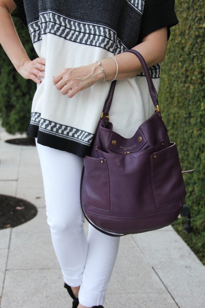 LadyinViolet carries the marc jacobs preppy leather hobo bag with her paige denim jeans.