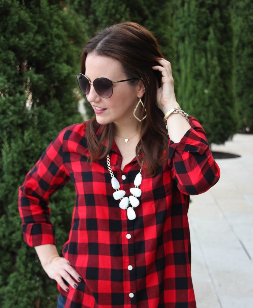 LadyinViolet dresses up a red and black plaid shirt with a long statement necklace.