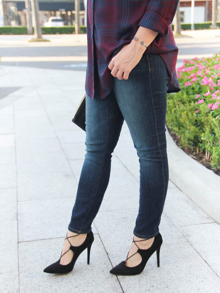 Texas Fashion Blogger wears Joes Jeans dark skinny jeans with black laceup heels.