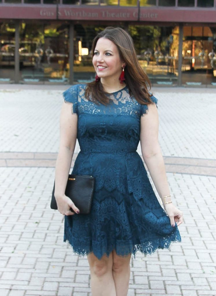 Houston Fashion blogger Lady in Violet styles the BB dakota lace dress in teal with baublebar astolat earrings for a holiday party outfit idea.