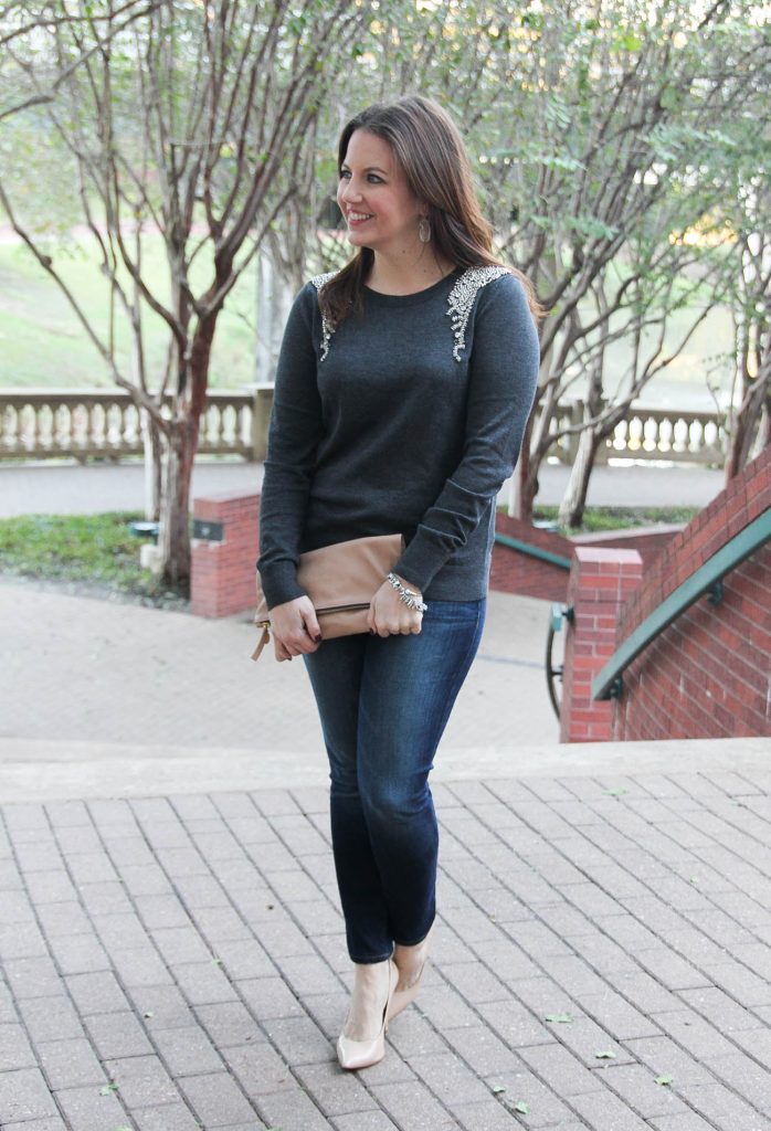 Houston Fashion Blogger shares winter outfit ideas for the holidays including an embellished sweater with dark jeans and nude heels.