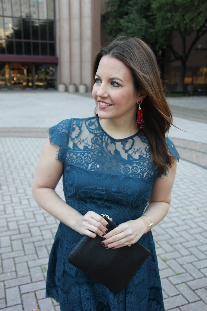 Houston Fashion Blogger Lady in Violet wears a lace holiday dress for under 100 dollars with red tassel earrings from Baublebar and Nordstrom.