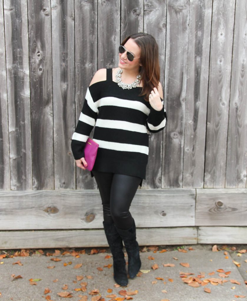 Houston Fashion Blogger Lady in Violet wears a casual new year's eve outfit with a cold shoulder sweater and leather leggings with suede boots.