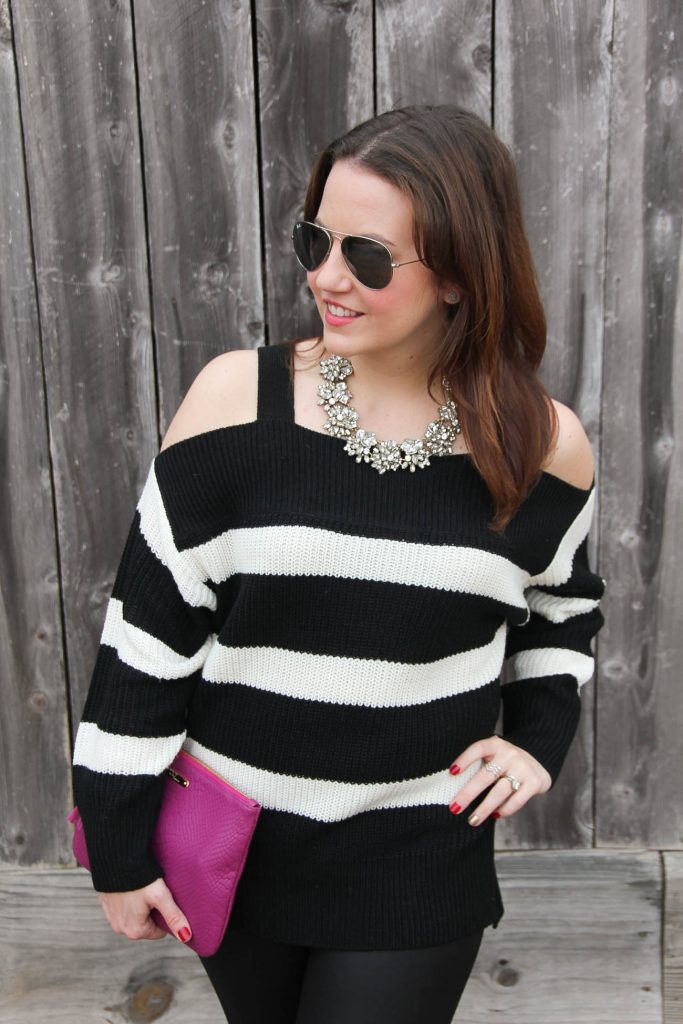 Houston style blogger Lady in Violet wears a cute statement necklace with a cold shoulder striped sweater for a winter outfit idea.