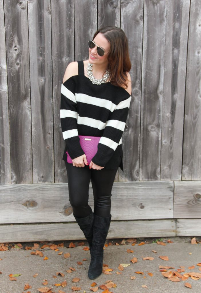 Houston Style Blogger Lady in Violet wears a casual New Year's Eve outfit featuring leather leggings and suede boots with a striped sweater.