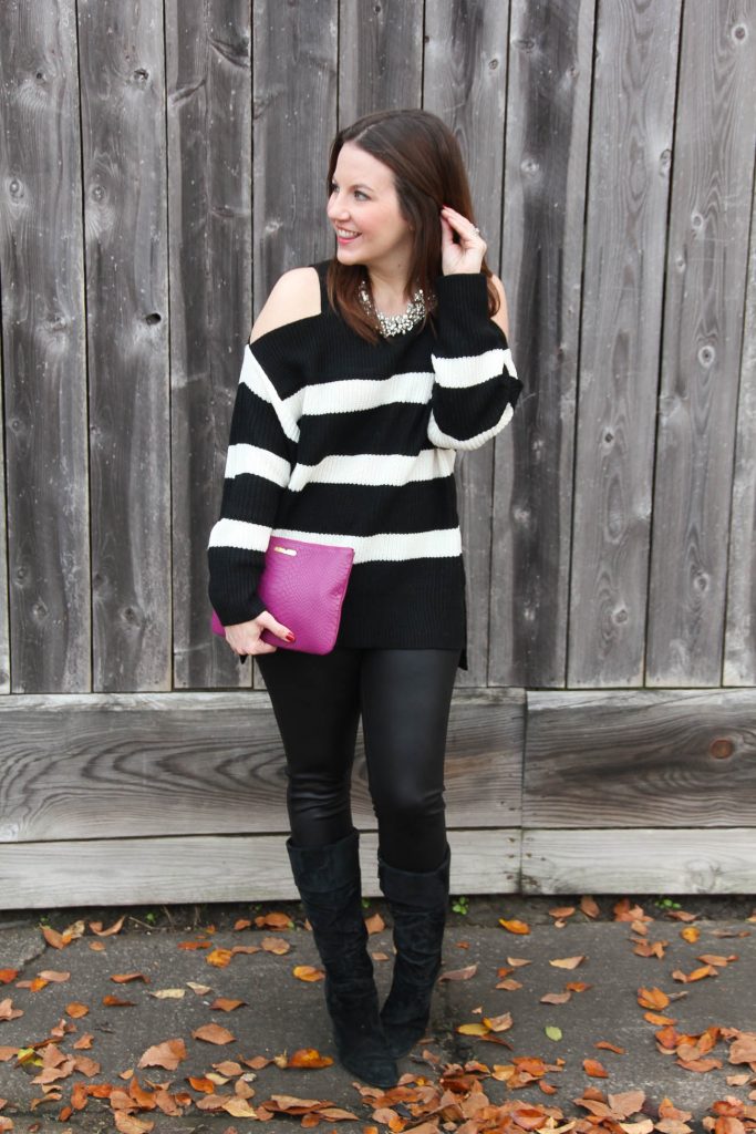 Houston Fashion Blogger, Karen Rock of Lady in Violet styles a casual New Years Eve outfit for cold weather with faux leather leggings and a cold shoulder sweater.