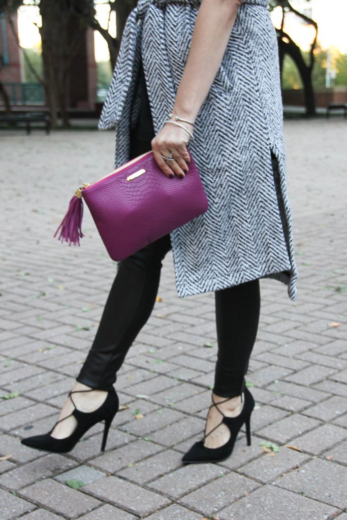 Houston fashion blogger Lady in Violet wears a winter outfit with leather leggings, long gray coat, and lace up heels.