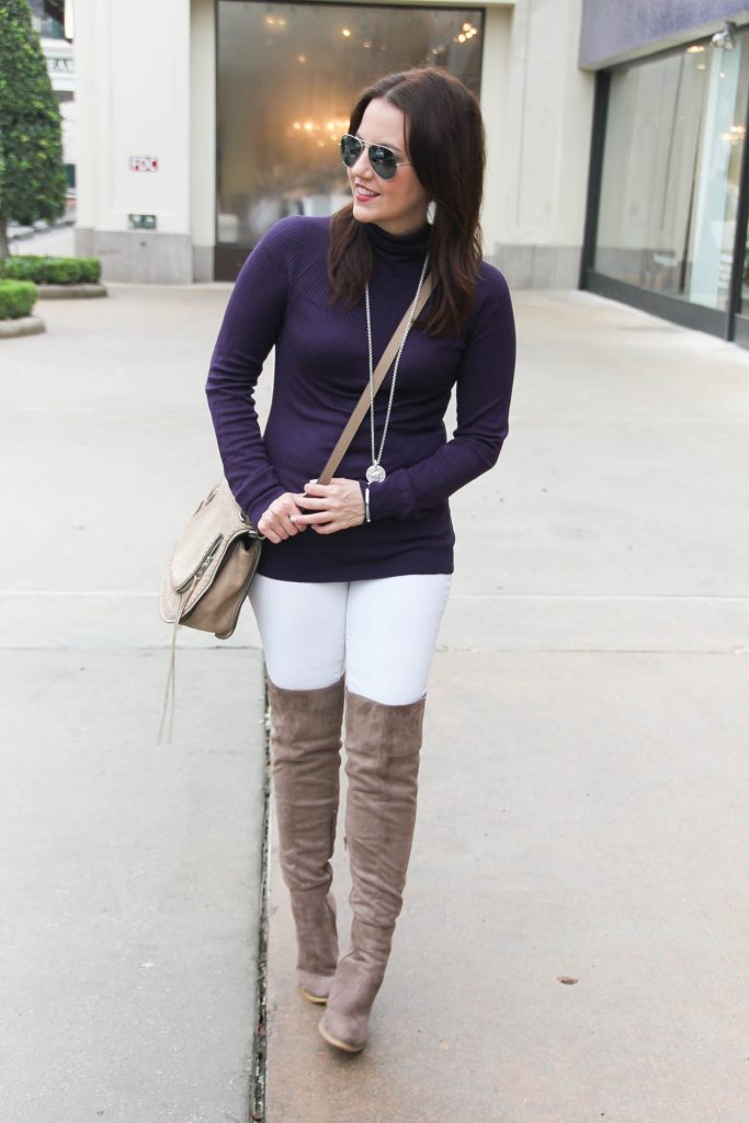 over the knee boots and jeans