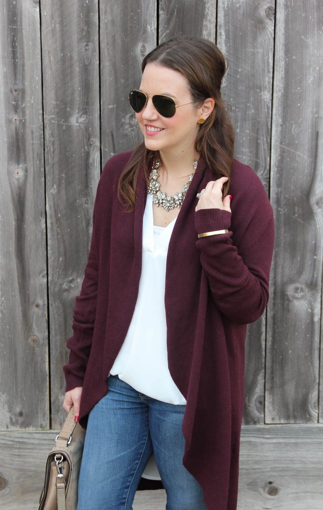 Houston Style Blogger Lady in Violet wears a casual weekend outfit including a maroon long cardigan with a white tunic and AG jeans.