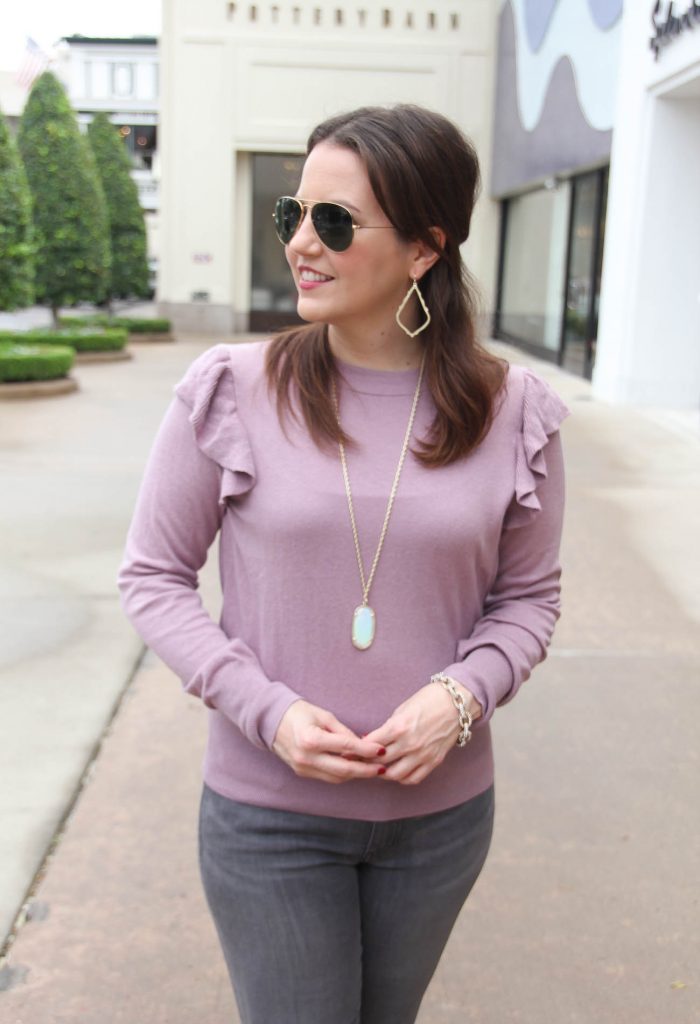 Houston Fashion Blogger styles winter trends including ruffle sweaters. Click through to shop exact sweater.