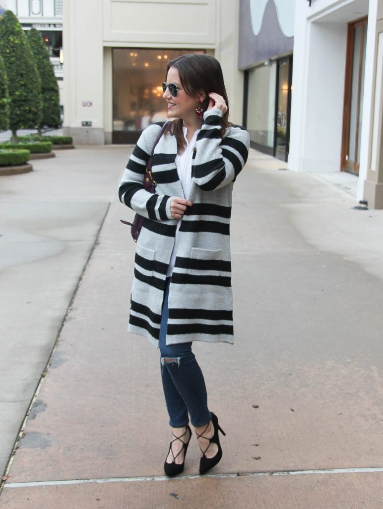 Houston Fashion Blogger styles a winter weekend outfit featuring a striped long sweater coat with distressed skinny jeans. Click through for outfit details.