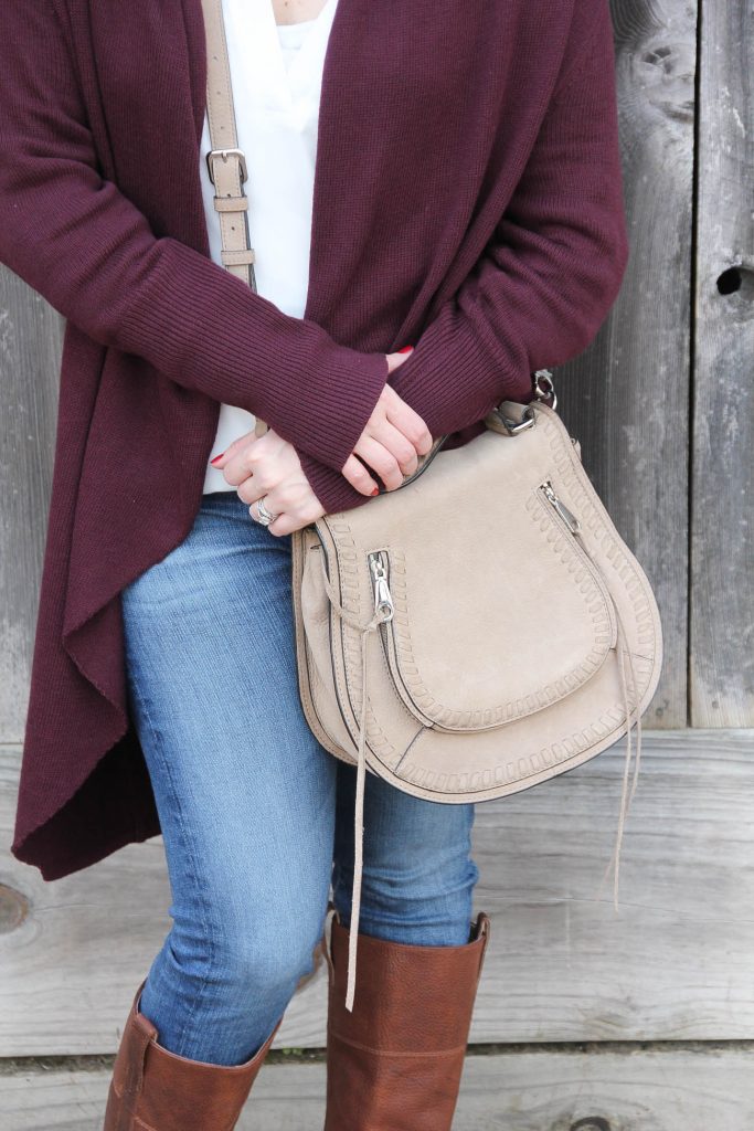 Houston Fashion Blogger Lady in Violet carries the Rebecca Minkoff Vanity Saddle Bag as part of a casual winter outfit idea.