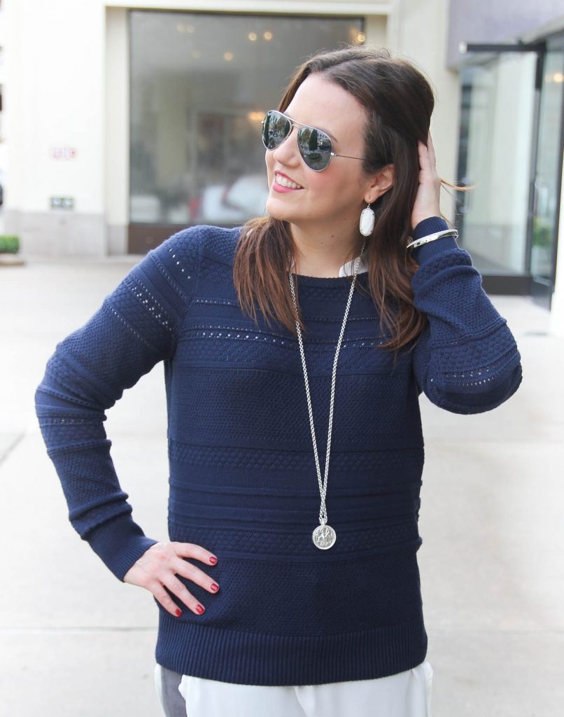 Houston Fashion Blogger Lady in Violet wears a cable knit navy sweater in an outfit for cold weather. Click through for outfit details.