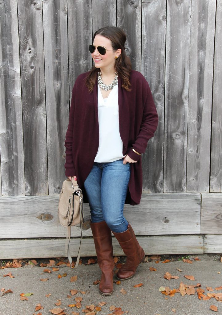 Houston Fashion Blogger styles a casual winter outfit for warm weather with riding boots and a long cardigan.