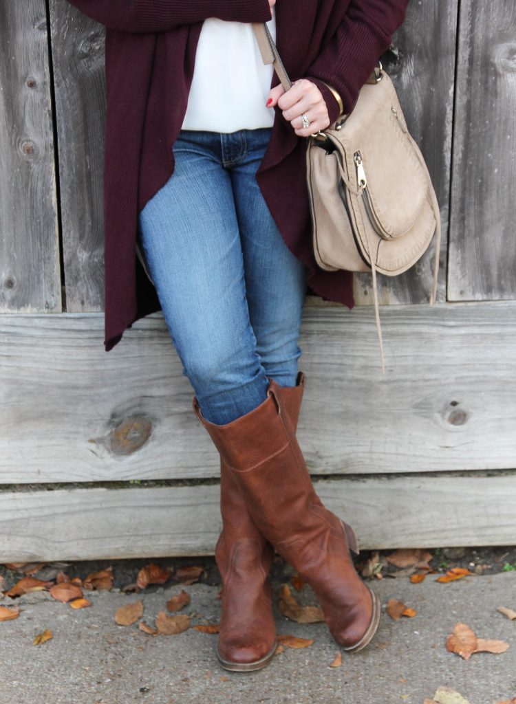 Houston Blogger Lady in Violet shows how to wear riding boots with ag skinny jeans and a maroon cardigan.