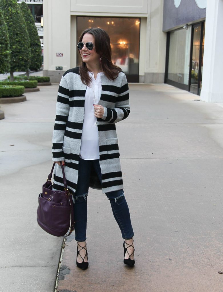 Texas Fashion Blogger Karen Rock styles a long striped coat for winter weekend brunch outfit with jeans. Click through for outfit information.