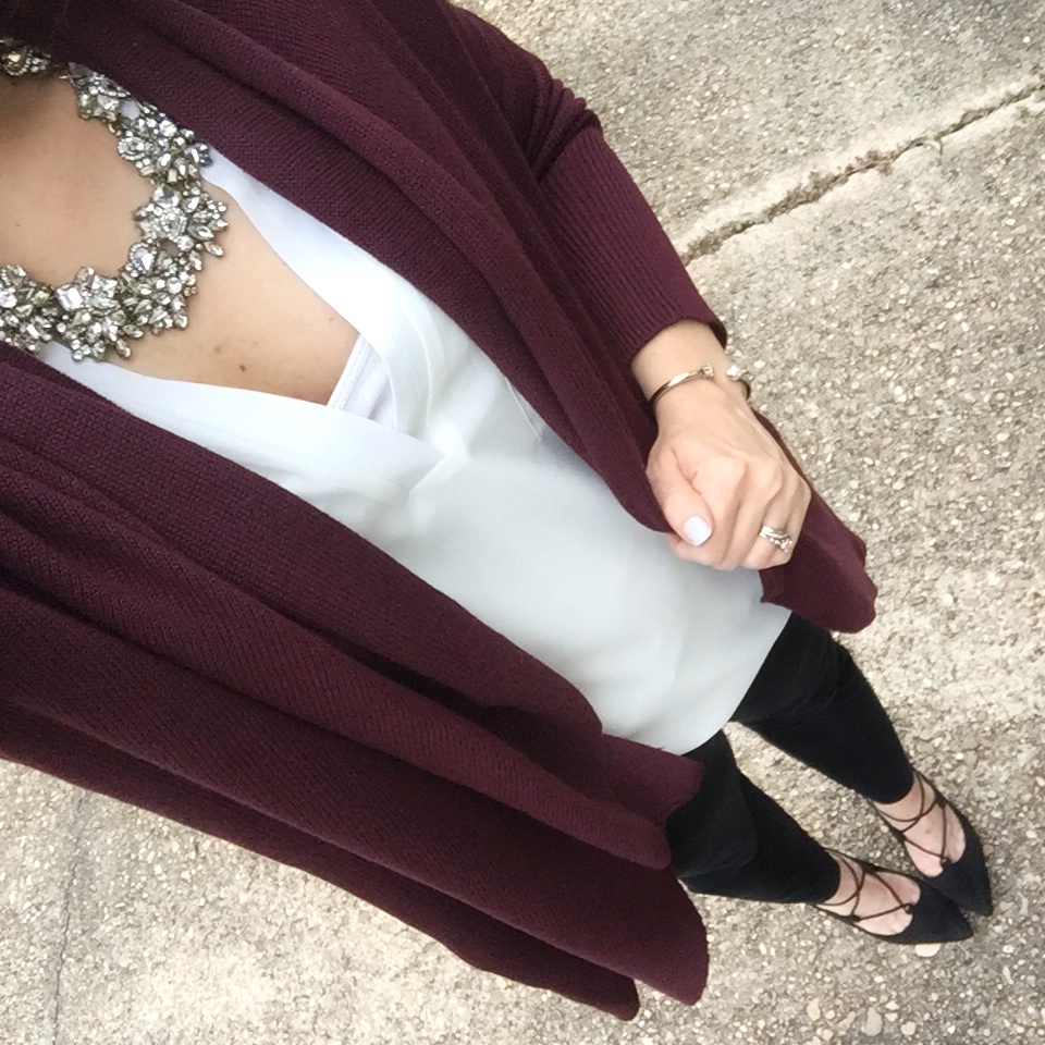 Houston fashion blogger wears a winter work outfit including a maroon cardigan with black slacks. Click through for outfit details.