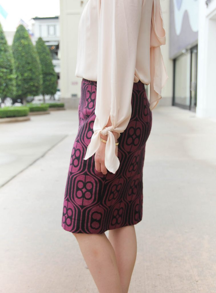 Houston Fashion Blogger Karen Rock styles a winter work outfit idea featuring a pencil skirt and bow blouse. Click through for outfit details.