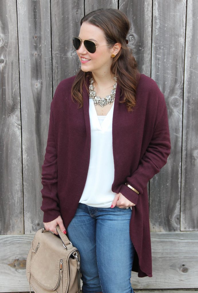 Houston Fashion blogger styles a casual weekend outfit with statement necklace and burgundy circle cardigan.