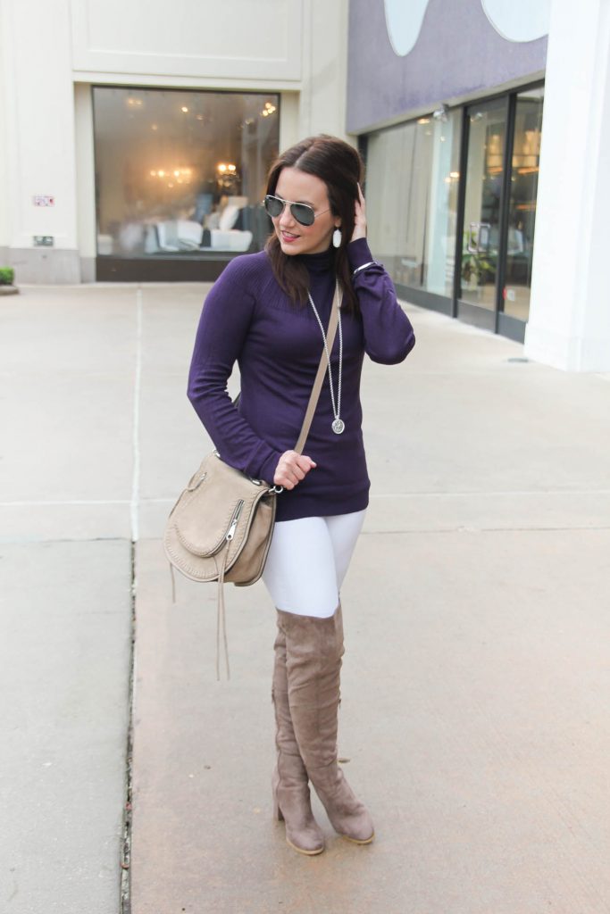 Houston Fashion Blogger wears a winter outfit idea featuring a lightweight sweater, white skinny jeans and over the knee boots. Click through for outfit details.