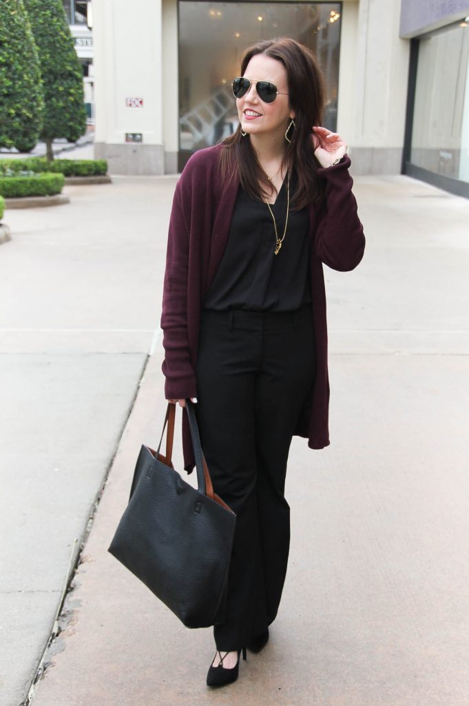 Houston Fashion Blogger styles a cozy and chic winter outfit idea featuring a cocoon Cardigan in burgundy.