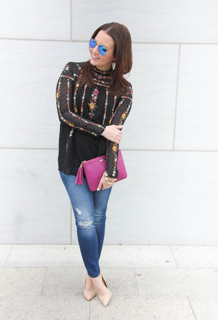 Houston Fashion Blogger wears a weekend outfit idea including a floral embroidered blouse with distressed jeans.