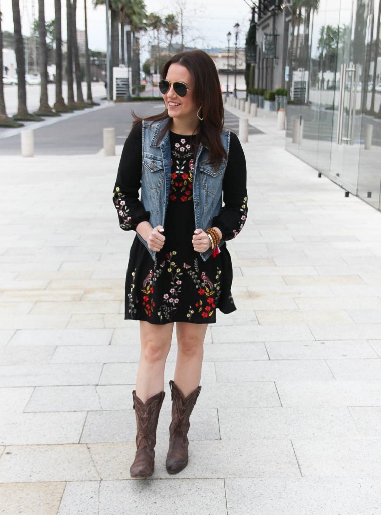 Houston Fashion Blogger shares what to wear to the Houston Rodeo including an embroidered dress and cowboy boots.