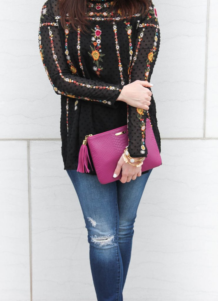 Karen Rock, a Houston area fashion blogger wears Chicwish top with blank denim distressed jeans.