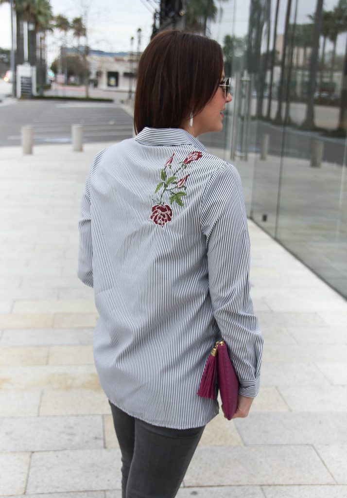 Lady in Violet, a Houston Fashion Blogger wears a rose embroidered blouse that would be perfect for the Beauty and Beast movie night.