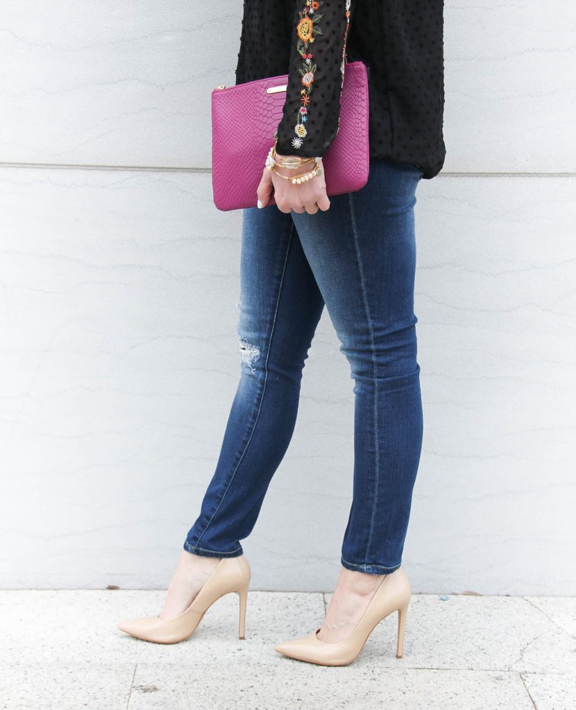 Lady in Violet, a Houston Fashion Blogger wears a jeans and heels outfit for girls night out.