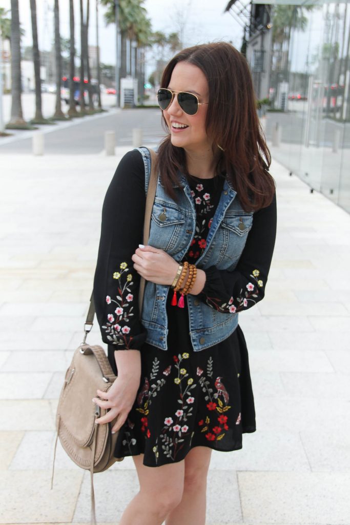 Lady in Violet, a texas fashion blogger styles a boho chic outfit for a music festival including an embroidered dress and vest.