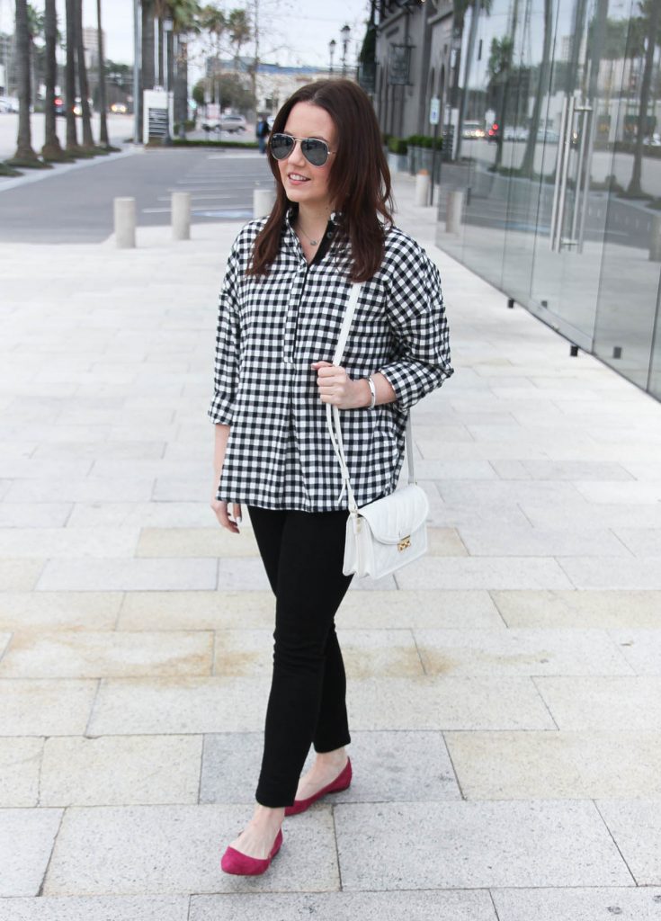 Lady in Violet, a Houston based fashion blogger wears a weekend outfit idea including a gingham blouse with black jeans.